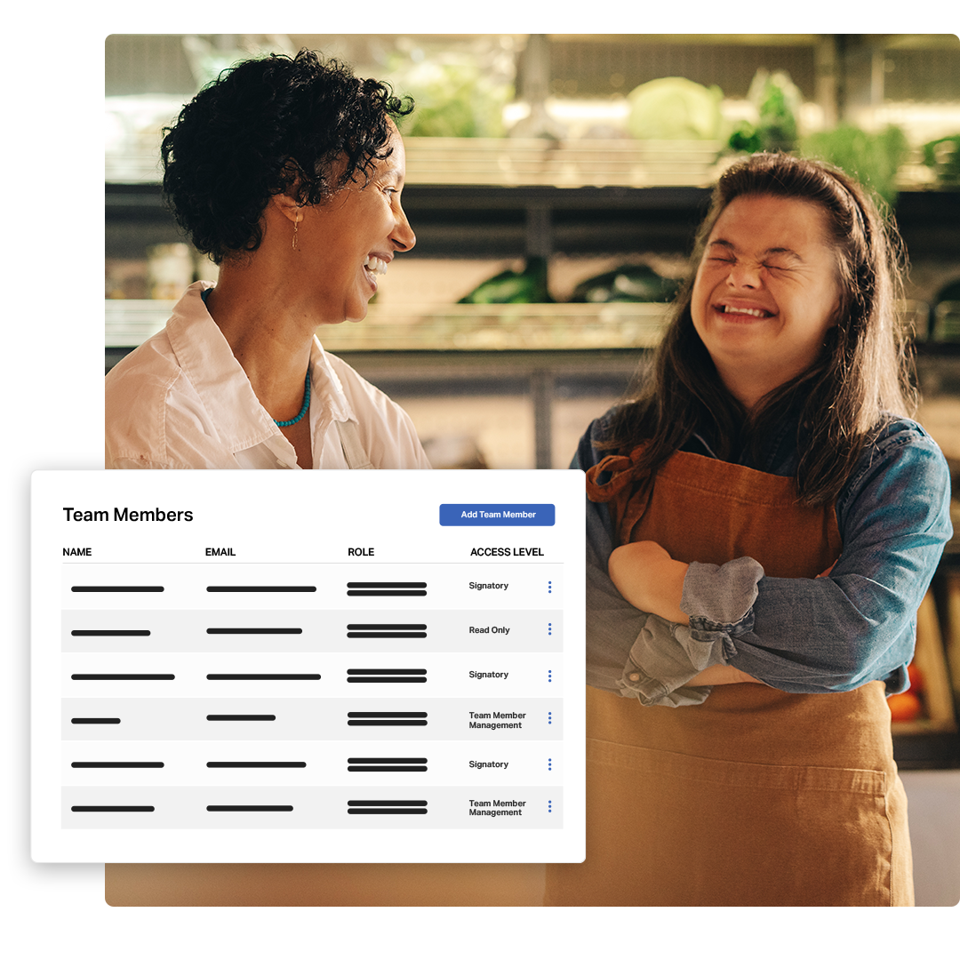 Two women laughing together in a shop, with an overlaid screenshot of a team members management table