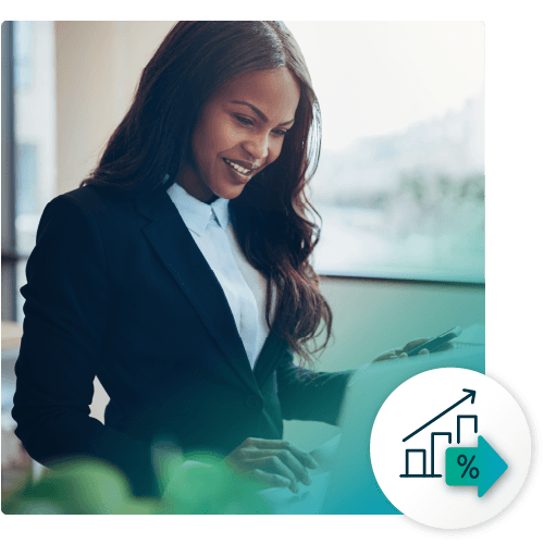 A businesswoman smiling while reviewing documents, with an icon of a rising bar chart and percentage sign